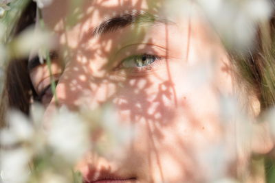 Close-up portrait of teenage girl outdoors