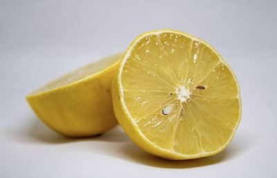 Close-up of lemon slice on table