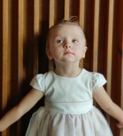 Portrait of cute girl looking away