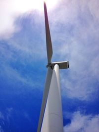 Low angle view of windmill against sky