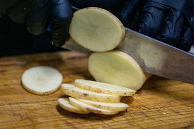 High angle view of chopped bread on cutting board