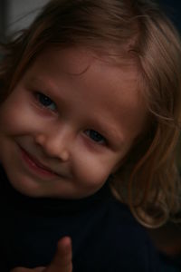 Close-up portrait of smiling girl