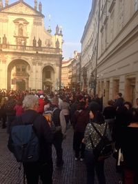 People walking on street in city