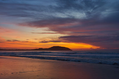 Scenic view of sea against sky during sunset