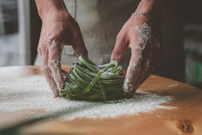 Close-up of person preparing food