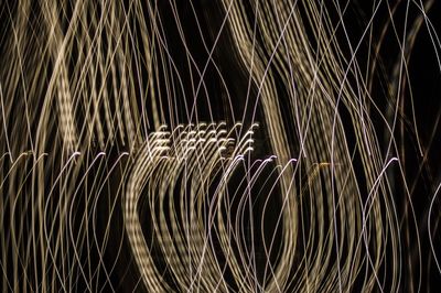 Close-up of illuminated lighting equipment at night