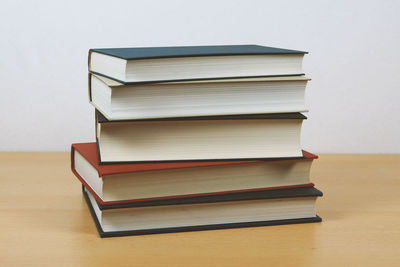 Stack of books on table