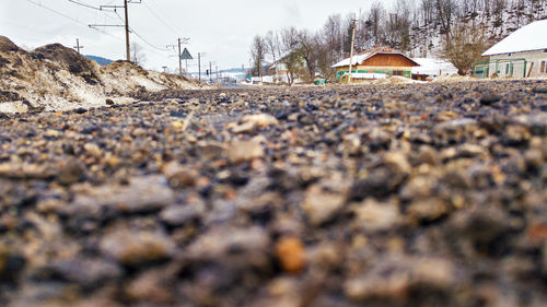 Surface level of railroad track amidst buildings