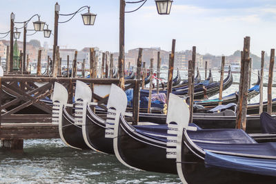 Boats moored in canal