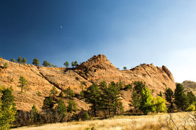 Scenic view of rocky mountains against sky