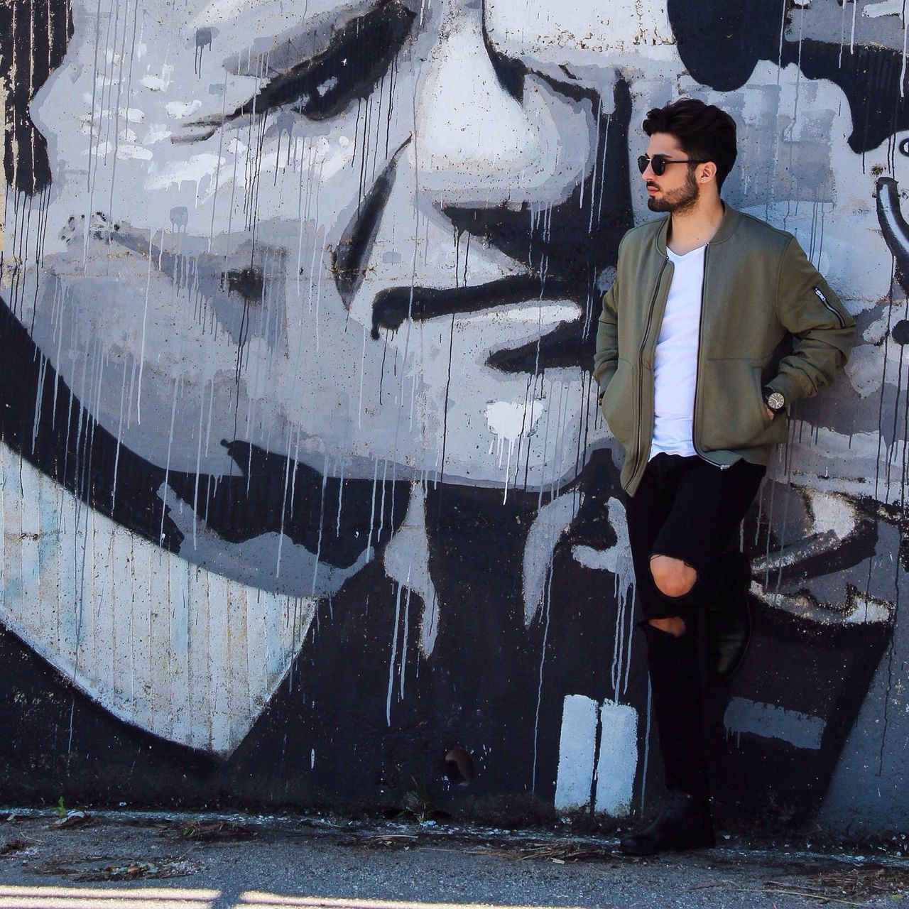 FULL LENGTH PORTRAIT OF MAN STANDING IN A CITY