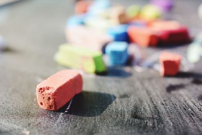 Multi colored chalks on table