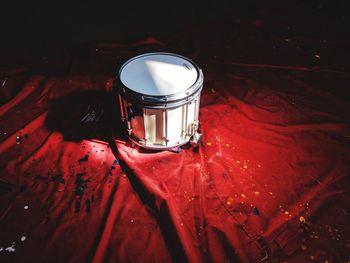 High angle view of illuminated drum on table