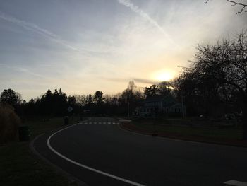 Empty road at sunset