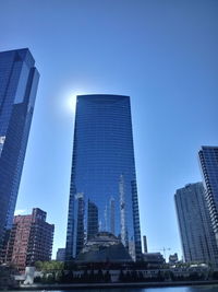 Low angle view of modern buildings against clear sky