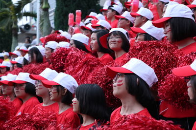 Rear view of people in traditional clothing