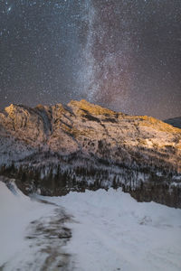 Scenic view of star field against sky at night