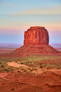 Rock formations on landscape against sky