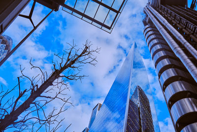 Low angle view of skyscraper against sky