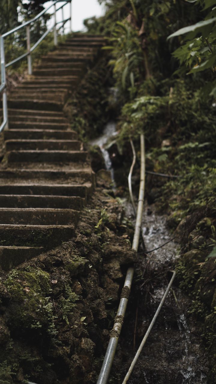 STAIRCASE OF WATER FLOWING THROUGH ROCKS