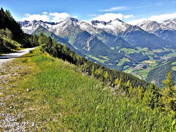 Scenic view of snowcapped mountains against sky