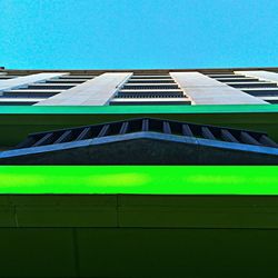 Low angle view of building against blue sky