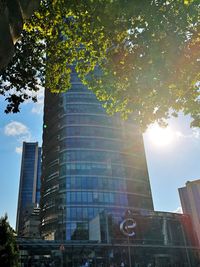 Low angle view of modern buildings against sky