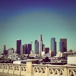 View of cityscape against clear sky