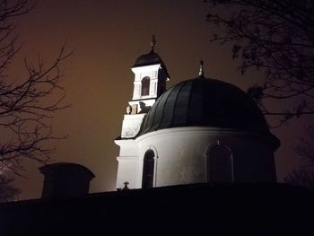 Cathedral against sky at night