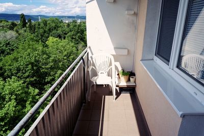 High angle view of trees by building