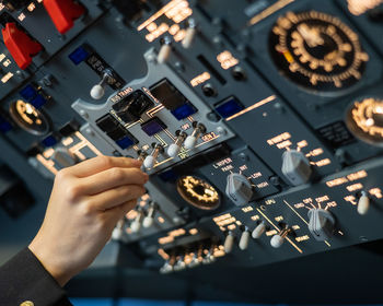 Cropped hand of man holding circuit board