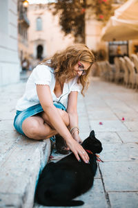 Woman sitting outdoors