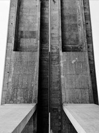 Low angle view of closed wooden door of building