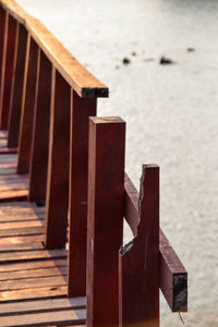 Wooden posts on beach