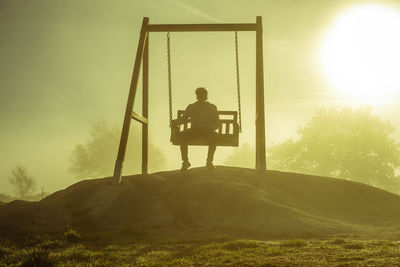 Man on a swing