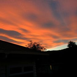 Low angle view of building at sunset