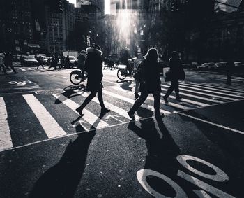 Group of people crossing road