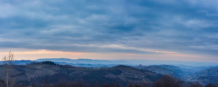 Scenic view of mountains against sky during sunset