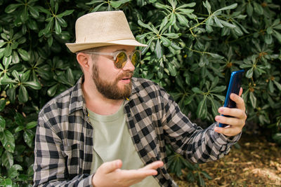 Young man using mobile phone