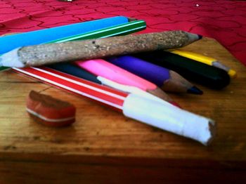 High angle view of pencils on table