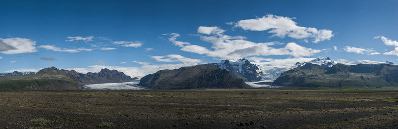 Scenic view of landscape with mountains against sky