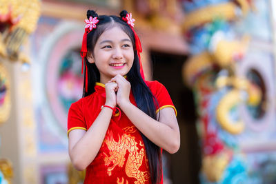 Portrait of a smiling young woman