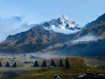 Scenic view of snowcapped mountain against sky