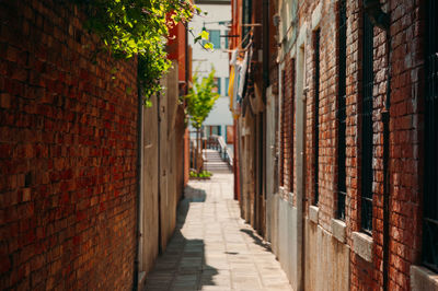 Narrow alley along buildings