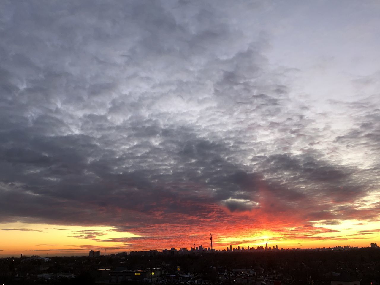 SCENIC VIEW OF DRAMATIC SKY OVER CITY