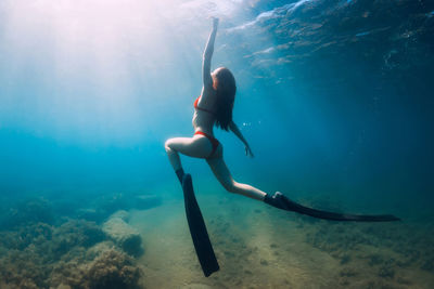 Man swimming in sea