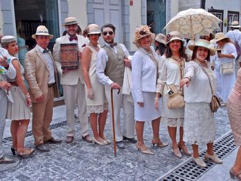 Group of people standing outside building