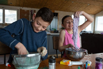 Kids playing with homemade slime they made