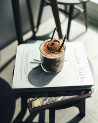 High angle view of coffee cup on table