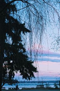 Scenic view of lake against sky during winter
